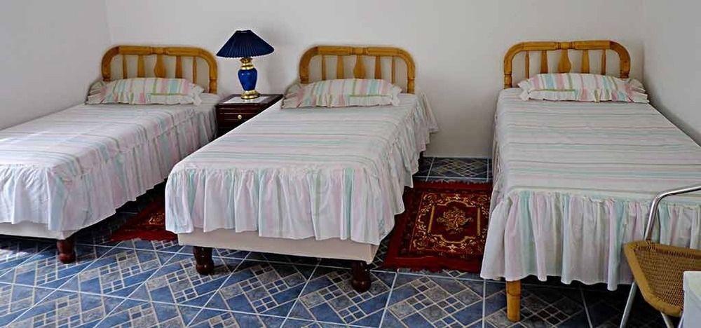 Hostal Insular Puerto Villamil Esterno foto