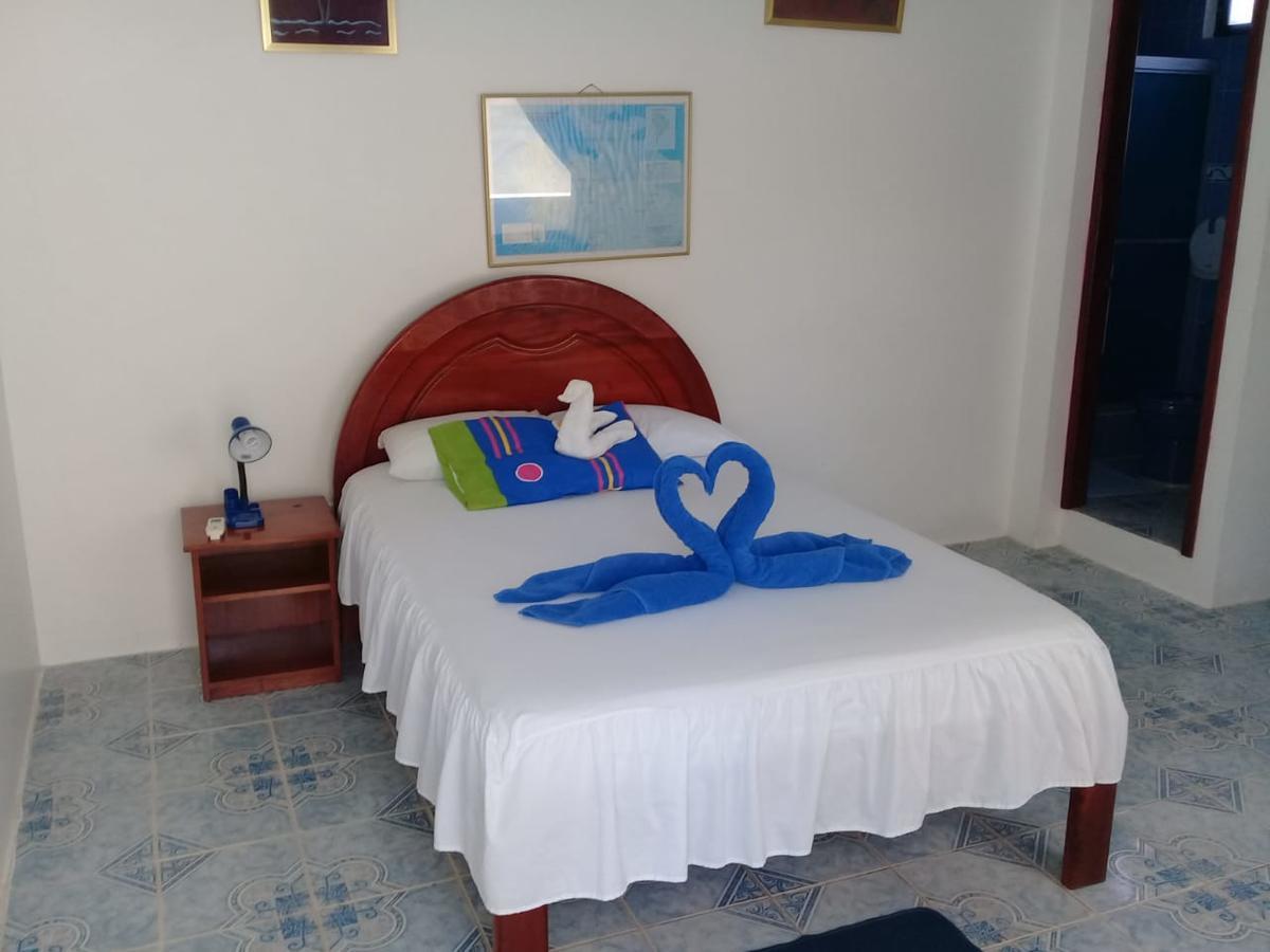 Hostal Insular Puerto Villamil Esterno foto
